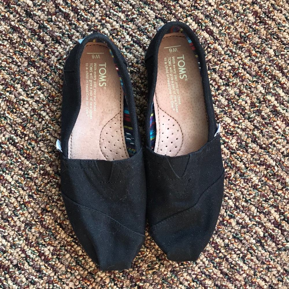 TOMS black slip on shoes size 6